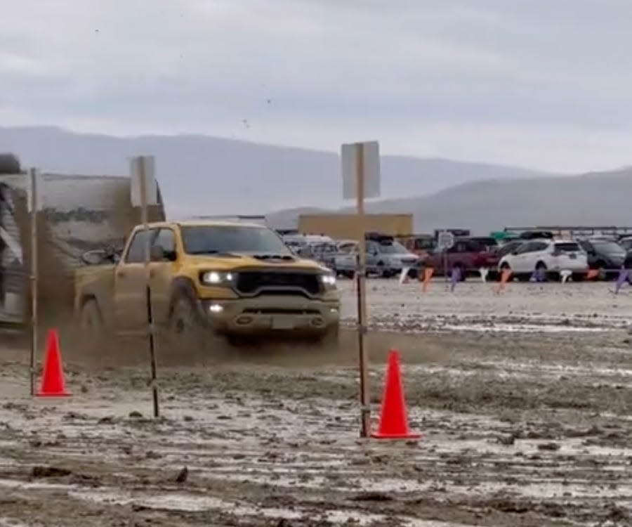 Ram 1500 TRX driving through mud