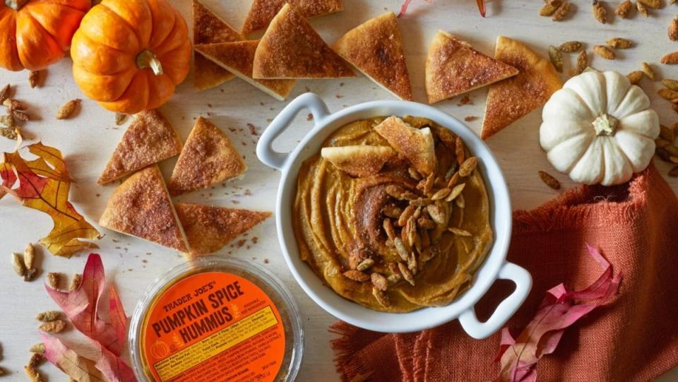 Pumpkin spice hummus with crackers and pumpkins