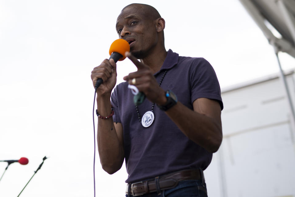 Antone Melton-Meaux, an attorney challenging Rep. Omar, speaks at a Juneteenth celebration in Minneapolis. He's running as a bridge-builder who will better serve the district. (Photo: Stephen Maturen/Getty Images)