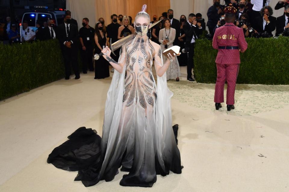 Grimes arrives  for the 2021 Met Gala at the Metropolitan Museum of Art in New York (AFP via Getty Images)