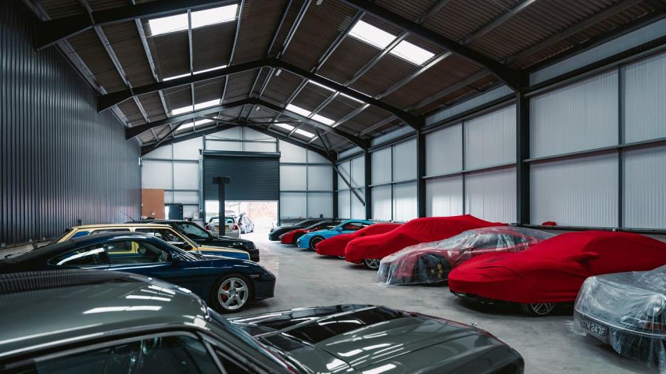 a large room with many cars in it