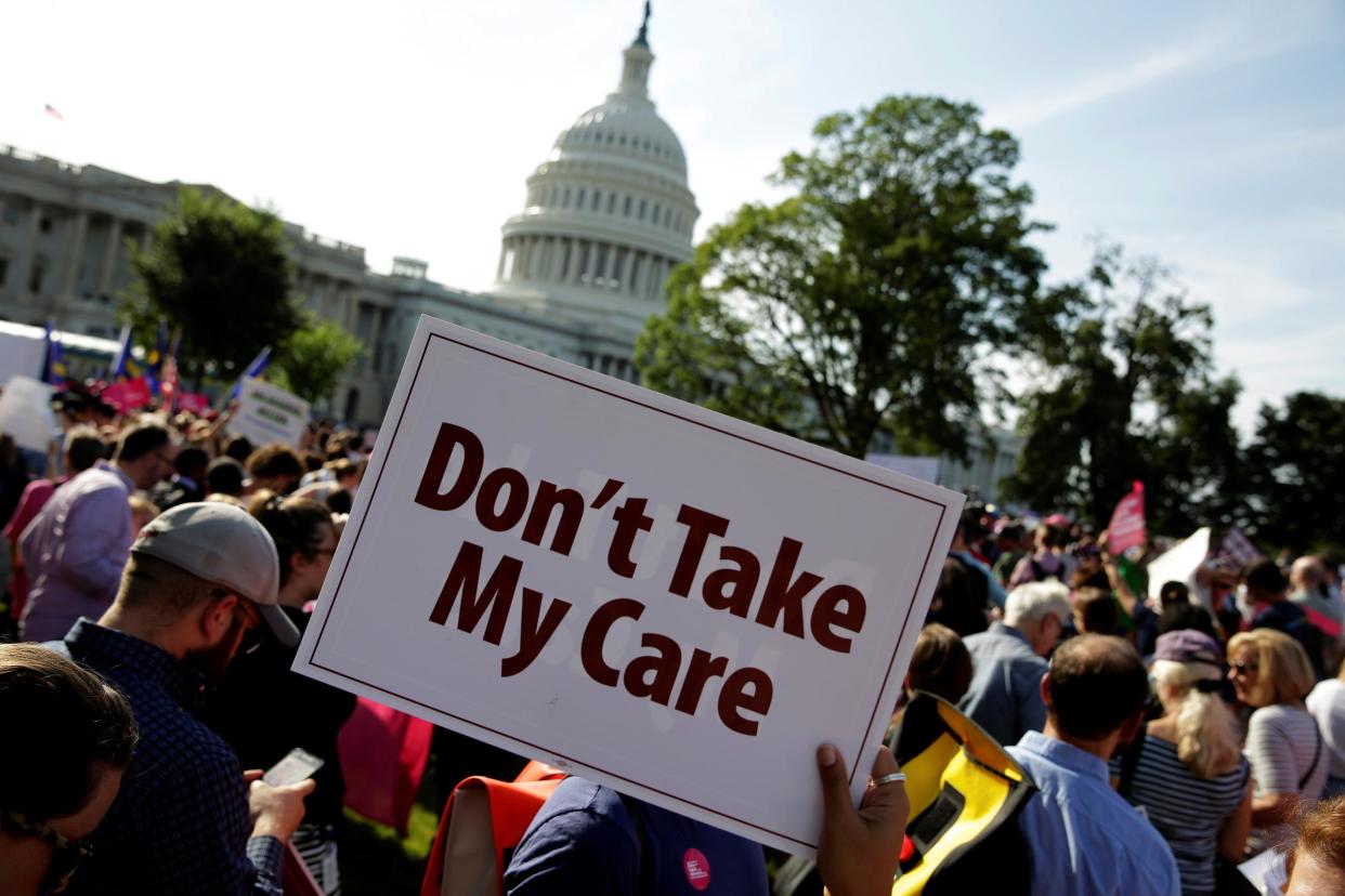 Healthcare activists with Planned Parenthood and the Center for American Progress protest in opposition to the Senate Republican healthcare bill on Capitol Hill in Washington, U.S., June 28, 2017: REUTERS