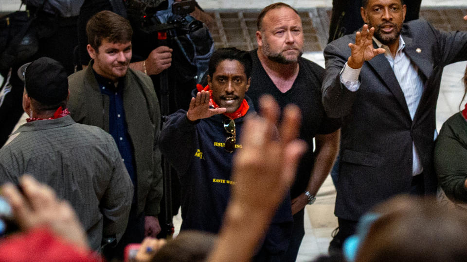 From right - Vernon Jones, Democratic Party member of the Georgia House of Representatives along with and conspiracy theorist Alex Jones and Ali Alexander organizer for Stop the Steal gather at the Georgia Capitol Building  on Wednesday, Nov. 18, 2020 in Atlanta, GA. (Jason Armond/Los Angeles Times via Getty Images)