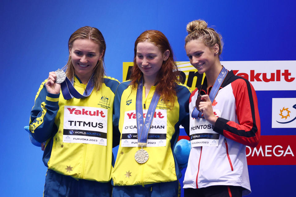 FUKUOKA, JAPAN - JULY 26:  Silver medallist Ariarne Titmus of Team Australia, gold medallist Mollie O'Callaghan of Team Australia and Summer Mcintosh of Team Canada pose during the medal ceremony for the Women's 200m Freestyle Final on day four of the Fukuoka 2023 World Aquatics Championships at Marine Messe Fukuoka Hall A on July 26, 2023 in Fukuoka, Japan. (Photo by Clive Rose/Getty Images)