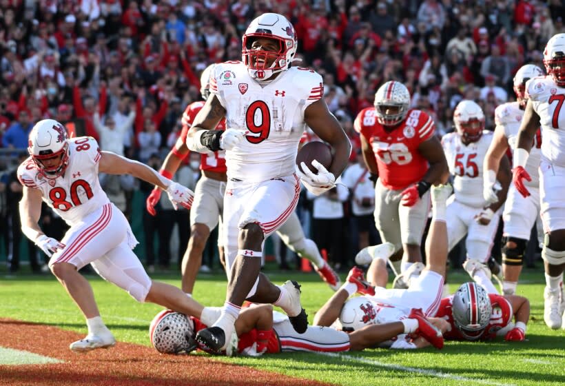 Pasadena, California January 1, 2022: Utah running back Tavion Thomas beats the Ohio State.