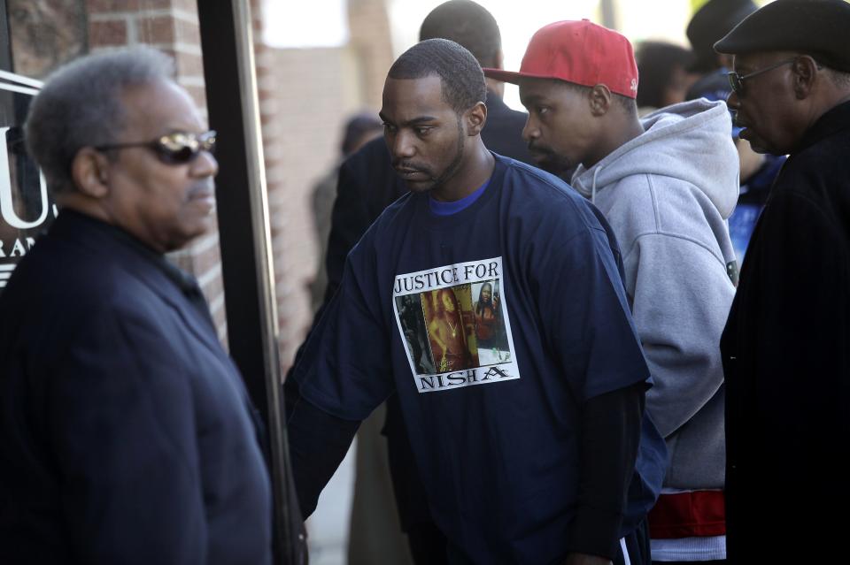 Mourners attend the funeral service for shooting victim Renisha McBride in Detroit