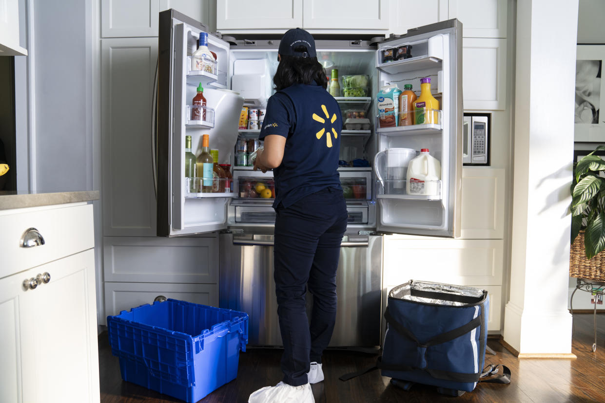 Walmart's InHome Delivery associates are trained on how to best organize a refrigerator. 