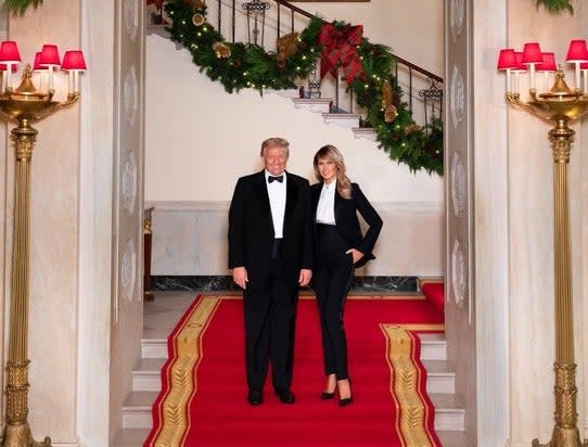 <p>Donald and Melania Trump wear matching tuxedos in their final Christmas card from the White House</p> (Official White House Photo by Andrea Hanks)