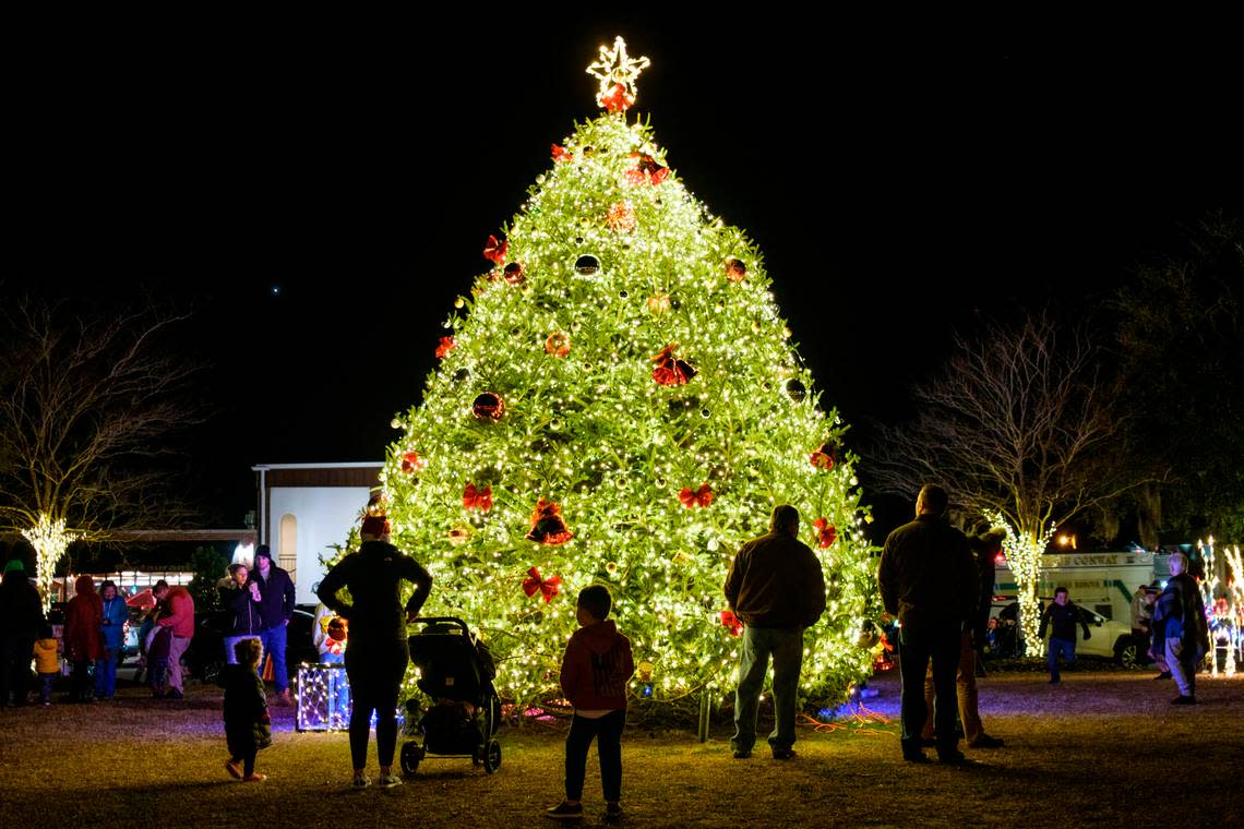Conway S.C. held the annual “Living Window” displays amid holiday festivities that included camel and horse drawn carriage rides, and live entertainment Thursday night. The historic river town has become a holiday destination for locals and visitors. Dec. 9, 2021.