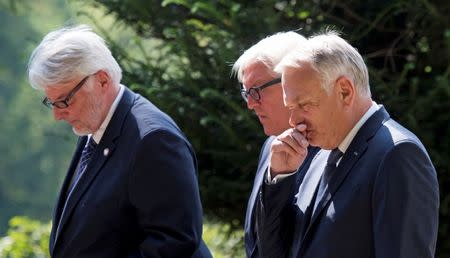 German Foreign Minister Frank-Walter Steinmeier (C), Poland's Foreign Minister Witold Waszczykowski (L) and French Foreign Minister Jean-Marc Ayraultin arrive to the Weimar Triangle meeting in Weimar, Germany, August 28, 2016. REUTERS/Jens Meyer/Pool