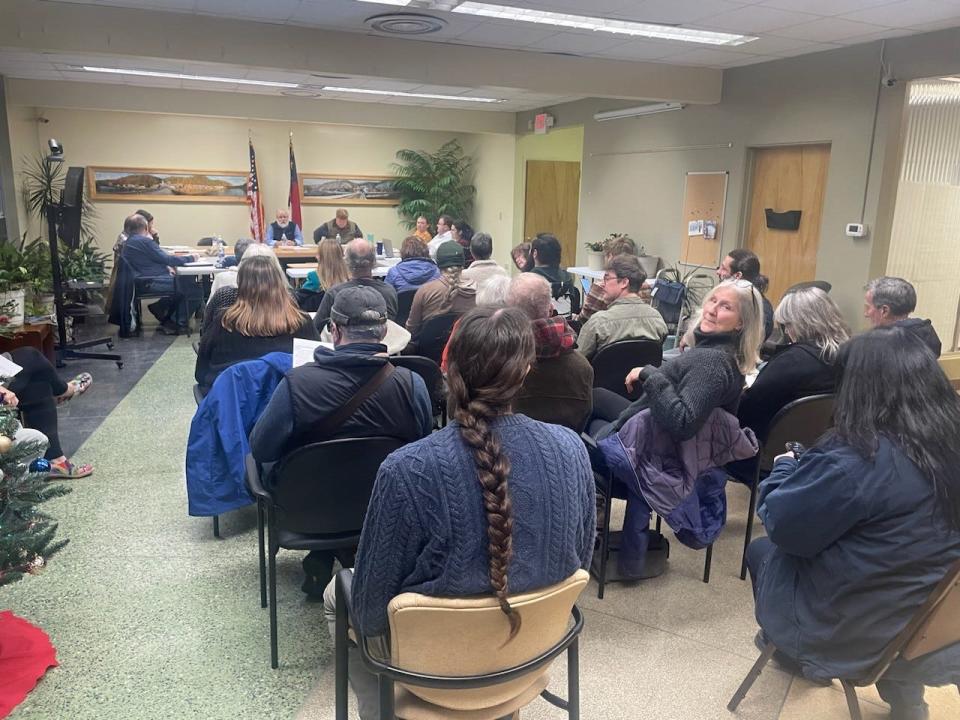 Marshall residents turned out in numbers to the Marshall Board of Adjustment meeting, in which the board deliberated on issuing a special use permit to an applicant proposing six campsites on 40 acres along Redmon Road.