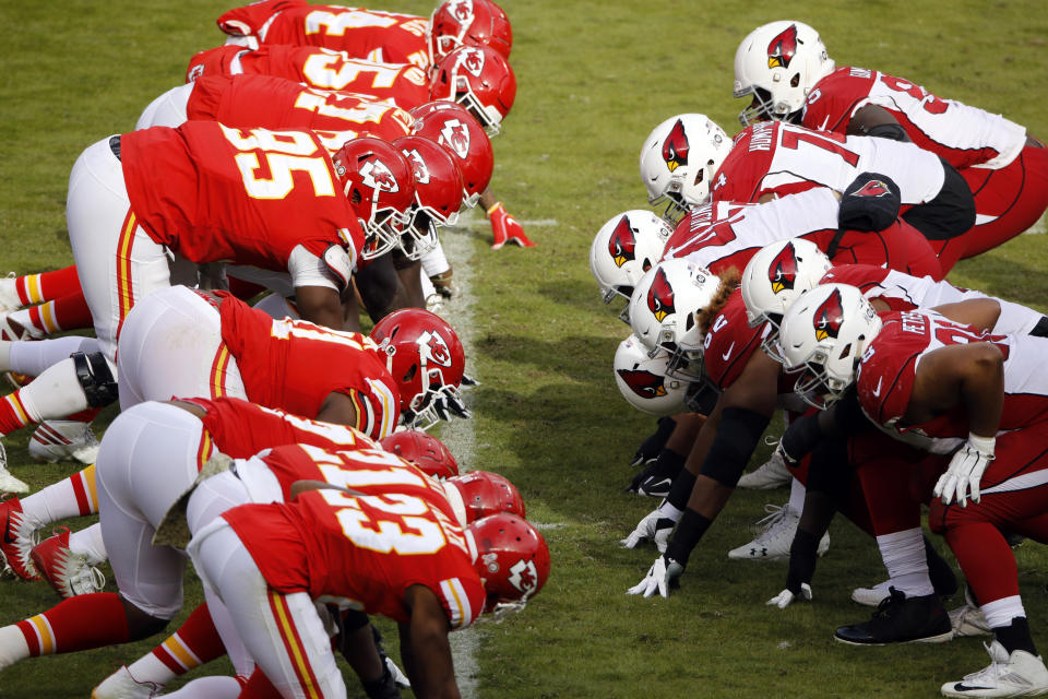 The Kansas City Chiefs, left, lines up against the Arizona Cardinals during the second half of an NFL football game in Kansas City, Mo., Sunday, Nov. 11, 2018. (AP Photo/Charlie Riedel)