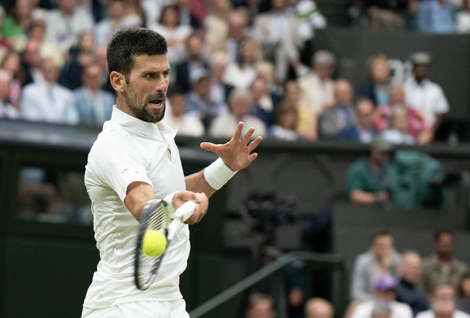 Novak Djokovic returns a shot during his match against Jannik Sinner that booked his final place against Carlos Alcaraz at Wimbledon (Reuters via Beat Media Group subscription)