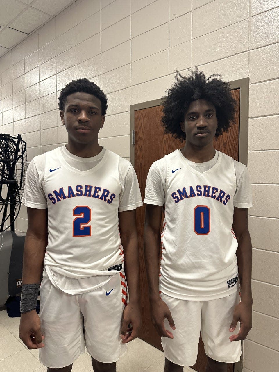 Johnson's Antonio Baker (left) and Josh Quarterman after a win over Calvary Day.