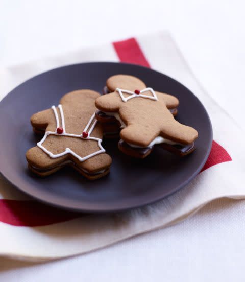 <p>Replace the graham cracker with handmade gingerbread cookies, and the individual slab of chocolate and marshmallow with a marshmallow-cream cheese and chocolate frosting for the best smore's your kids will ever have. </p><p><em><a href="https://www.womansday.com/food-recipes/food-drinks/recipes/a11881/gingerbread-men-smores-recipe-125168/" rel="nofollow noopener" target="_blank" data-ylk="slk:Get the recipe.;elm:context_link;itc:0;sec:content-canvas" class="link ">Get the recipe.</a></em> </p>