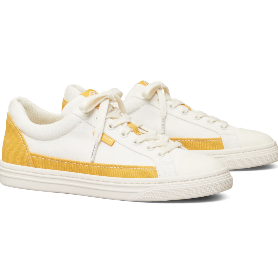 Tory Burch Classic Court Sneaker in white leather and yellow (Photo via Nordstrom)