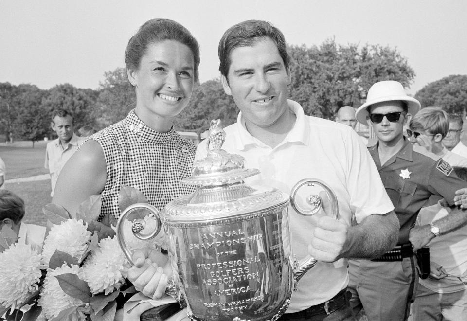 FILE - Dave Stockton of Westlake, Calif., and his wife, Cathy, hold the PGA Championship trophy after Stockton won the 72-hole tournament with a 1-under 279 at Southern Hills Country Club in Tulsa, Okla., Aug. 16, 1970. Southern Hills is hosting the PGA this week for a record fifth time. (AP Photo/File)