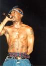 <p>Tupac Shakur at the Regal Theater in Chicago in March 1994.</p>