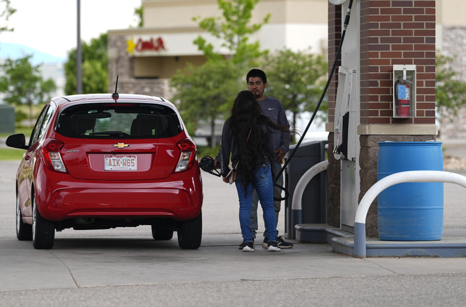 Motorists fill up the tank of a car at a gasoline station on Tuesday, June 25, 2024, in Loveland, Colo. On Thursday, July 11, 2024, the Labor Department issues its report on inflation at the consumer level in June. (AP Photo/David Zalubowski)