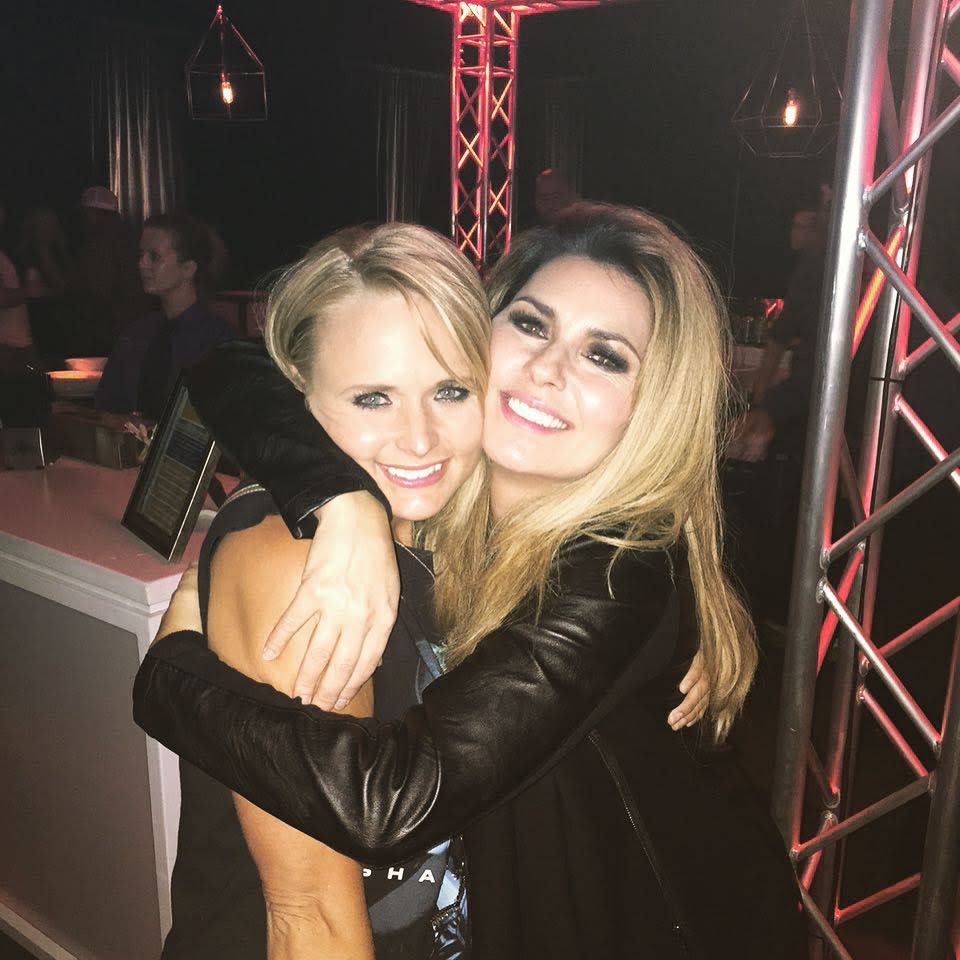 We think mama <em>would</em> approve of the way Miranda Lambert's handling this broken heart. Lambert was all smiles during a girls night out Saturday, when she took in her good friend Shania Twain's concert in Nashville. <strong>WATCH: Miranda Lambert Says She's Been 'Living Off Caffeine and Sad Songs'</strong> Twain shared an Instagram of the two in a big embrace. "Girls night, love seeing you! #RockThisCountry," she captioned the happy snap. The "Kerosene" singer showed an equal amount of love for her pal, sharing a photo of Twain riding high above her audience on a crane covered by a fringe saddle, which is also known as a heavy dose of country swag. It seems the show was exactly what Lambert, 31, needed. She added a few hashtags to the picture, but the most poignant one was the last: Music is medicine. <strong>WATCH: Blake Shelton Sounds Off on Divorce From Miranda Lambert</strong> BFFs have been featured heavily on Lambert's social media since her divorce from husband Blake Shelton. Earlier this week, she shared a photo with a pal and thanked Jesus for coffee, girlfriends and concealer, and she's also been both hanging out with her friend Ashley Monroe and promoting Monroe's new album -- as has Shelton. Lambert has always been a big supporter of not just the main gals in her life but all women in music. Back in May, Lambert, who is also part of the trio Pistol Annies with Monroe, tweeted that she will always "do everything in my power to support and promote female singer/songwriters in country music. Always." I am gonna do everything in my power to support and promote female singer/songwriters in country music. Always.— Miranda Lambert (@mirandalambert) May 28, 2015 <strong>PHOTOS: Miranda Lambert Goes Makeup-Free and Quotes Beyonce</strong> That coffee photo is pretty apt for Lambert, as she recently admitted to fans that she was "living off caffeine and sad songs" during a concert. See the video below.