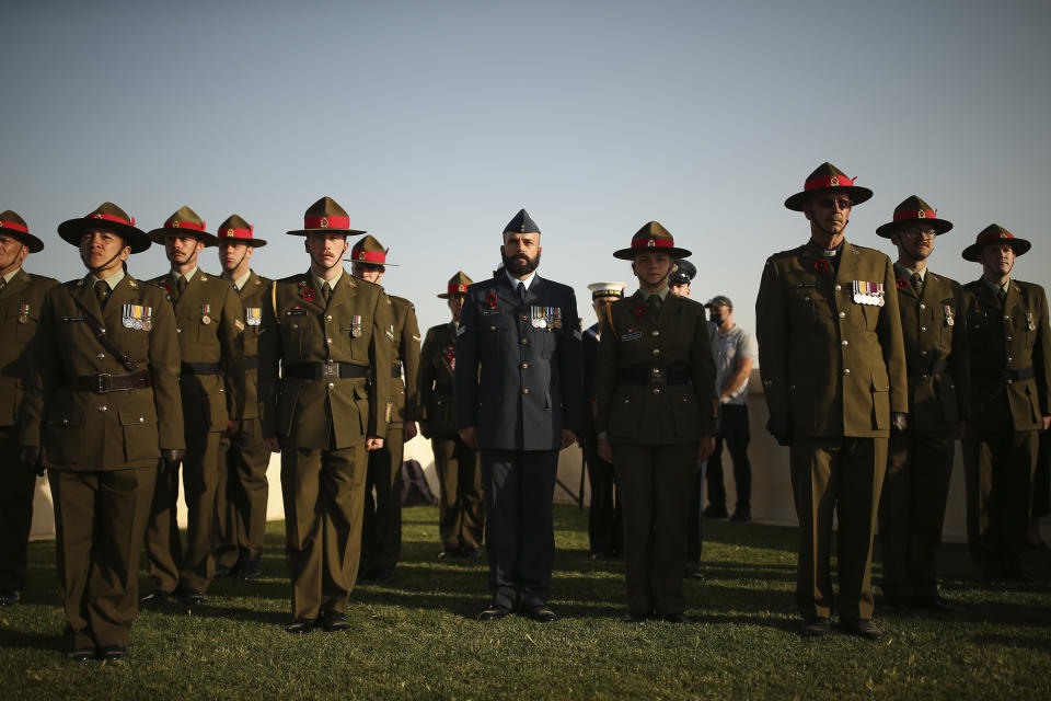 British, Australian and New Zealand soldiers attend a ceremony at the Helles Memorial in the Gallipoli peninsula, Turkey, Sunday, April 24, 2022. The annual Anzac Day ceremony on Monday, April 25 remembers the forces of the Australian and New Zealand Army Corps under British command in World War I who fought a bloody nine-month battle against Turkish forces on the Gallipoli peninsula in 1915. (AP Photo/Emrah Gurel)