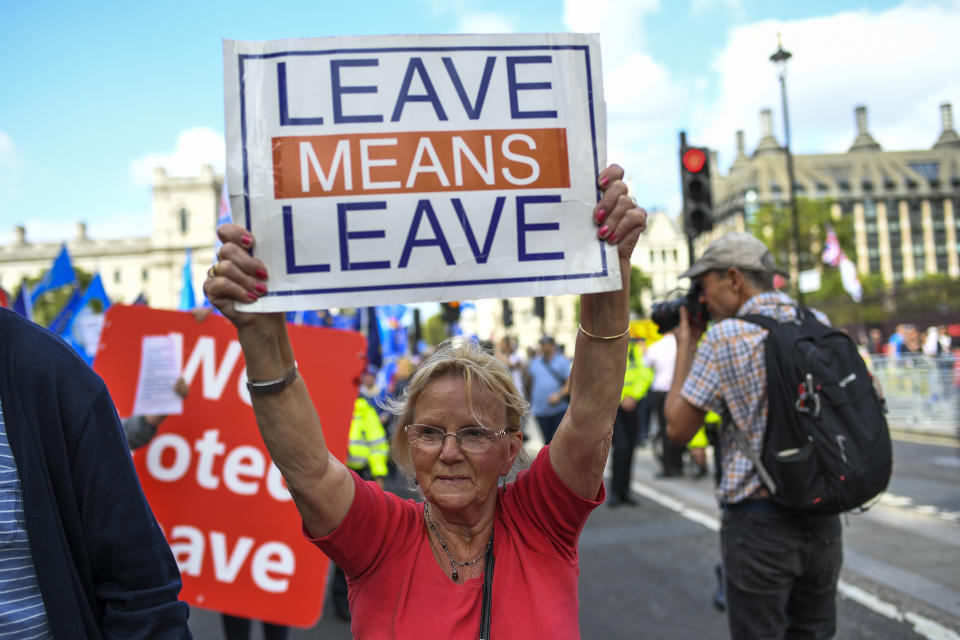 Pro Brexit demonstrators gather and march at Parliament Square, in London, Tuesday, Sept. 3, 2019. Lawmakers returned from their summer recess Tuesday for a pivotal day in British politics as they challenged Prime Minister Boris Johnson's insistence that the U.K. leave the European Union on Oct. 31, even without a withdrawal agreement to cushion the economic blow. (AP Photo/Alberto Pezzali)