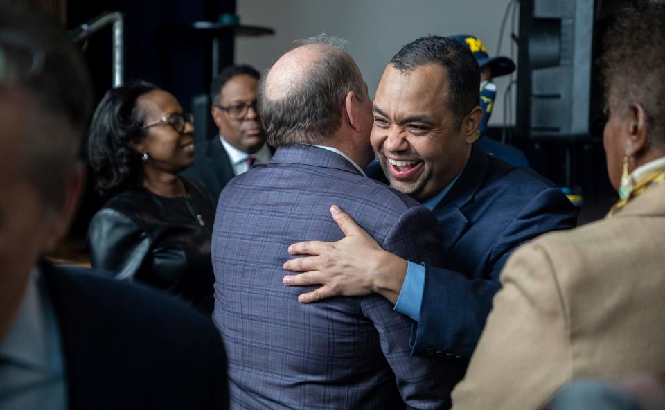 Councilmember Coleman A. Young II hugs Mayor of Detroit Mike Duggan during a press conference inside the Durfee Innovation Society building in Detroit on Friday, Jan. 27, 2023. 