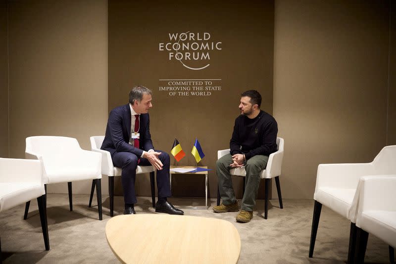 FILE PHOTO: Ukraine's President Zelenskiy and Belgium's Prime Minister De Croo attend a meeting in Davos