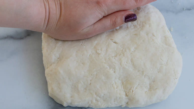 hand kneading dough