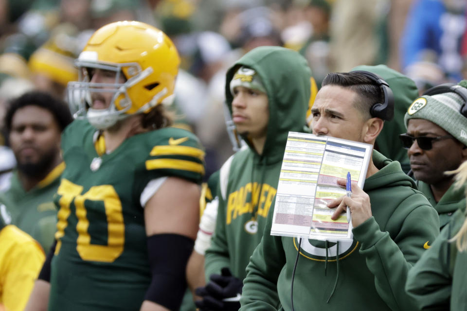 Green Bay Packers head coach Matt LaFleur, right, watches from the sideline during the first half of an NFL football game against the New York Jets, Sunday, Oct. 16, 2022, in Green Bay, Wis. (AP Photo/Mike Roemer)