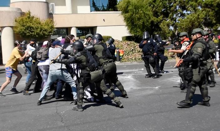 A video capture shows Sheriff’s deputies and Modesto Police engage protestors try and clear the area around the Planned Parenthood office on McHenry Ave during an opposition rally that began as a protest to the Straight Pride event in Modesto, Calif., on Saturday, August 27, 2022.