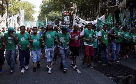 State workers march towards Plaza de Mayo square during a protest in Buenos Aires, Argentina, February 24, 2016. REUTERS/Marcos Brindicci