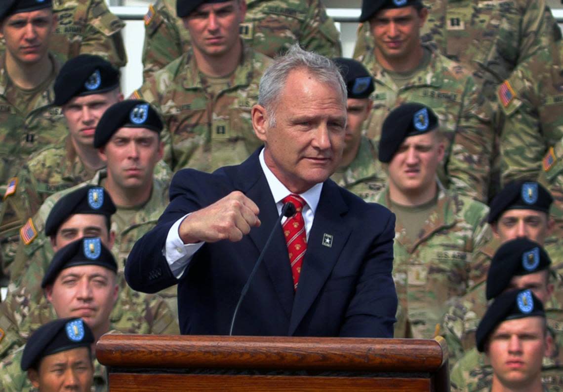 Retired Col. David M. Moore, the son of Lt. Gen. Hal and Julia Moore, speaks Thursday morning during a ceremony at Doughboy Stadium where Fort Benning was redesignated as Fort Moore. 05/11/2023