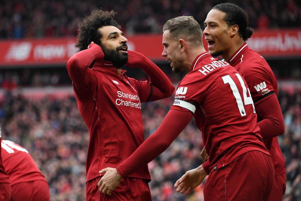 Mohamed Salah celebrates his stunning goal against Chelsea. (Credit: Getty Images)