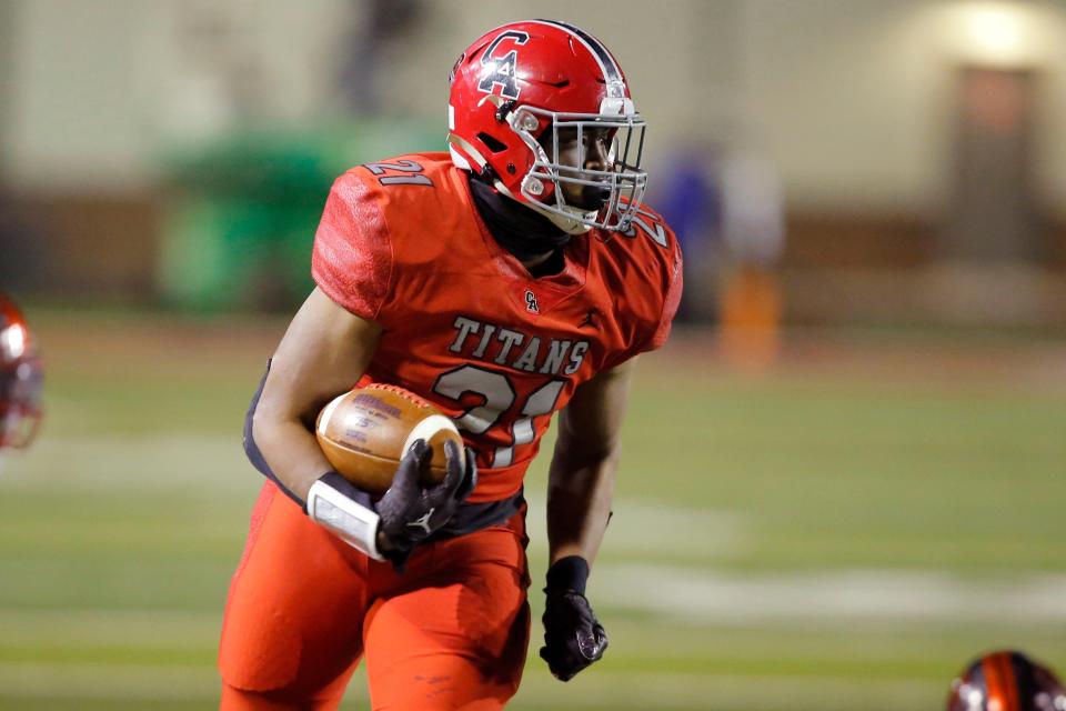 Carl Albert's Xavier Robinson runs for a touchdown during a high school football playoff game between Del City and Carl Albert in Midwest City, Okla., Friday, Nov. 18, 2022. 