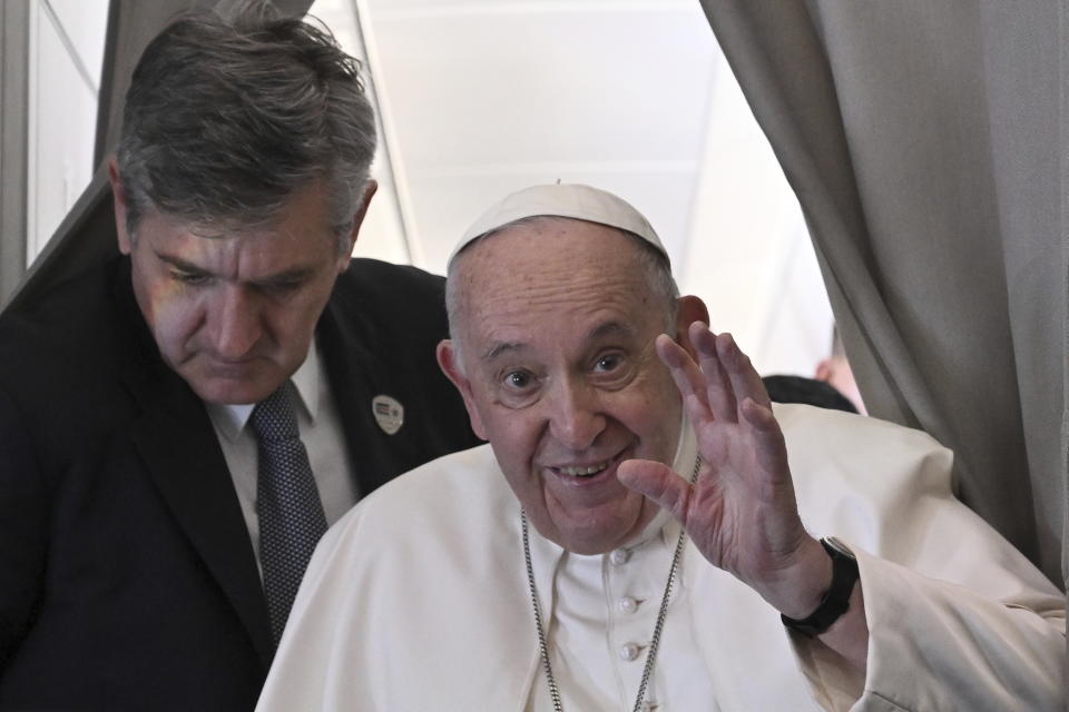 Pope Francis meets the journalists during an airborne press conference aboard the airplane directed to Rome, at the end of his pastoral visit to Congo and South Sudan, Sunday, Feb. 5, 2023. (Tiziana Fabi/Pool Photo Via AP)