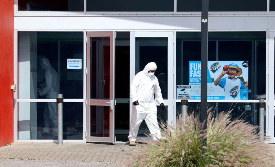 Cleaners can been seen at the The Denison Centre, part of the Mawson Lakes School in Adelaide.