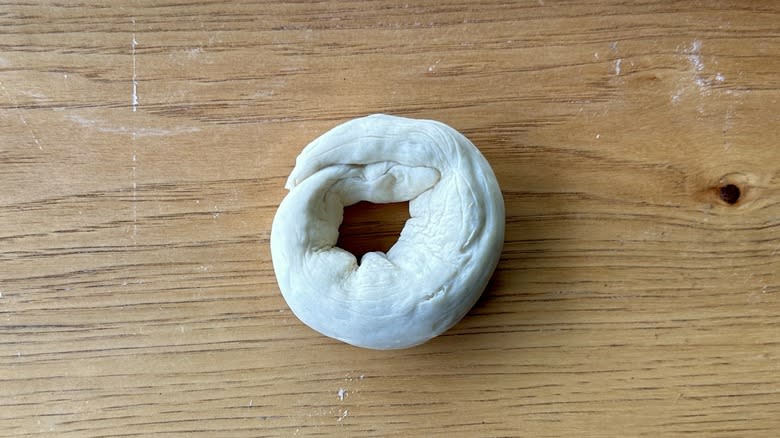 Bagel dough shaped into a ring