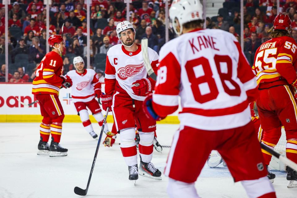 Detroit Red Wings center Dylan Larkin celebrates his goal with Detroit Red Wings right wing Patrick Kane during the second period against the Calgary Flames at Scotiabank Saddledome on Saturday, Feb. 17, 2024, in Calgary, Alberta.