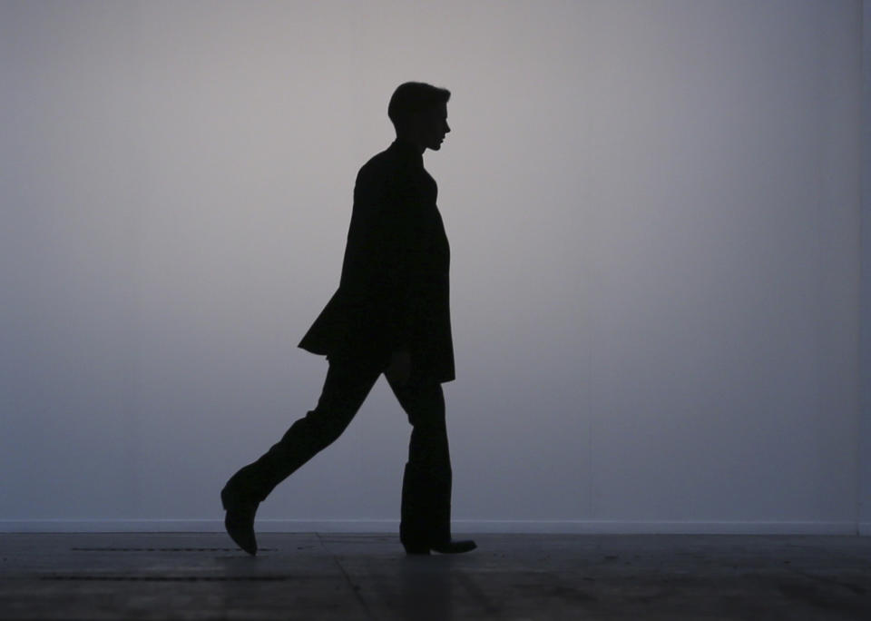 A model wears a creation for Costume National Homme men's Fall-Winter 2014 collection, part of the Milan Fashion Week, unveiled in Milan, Italy, Saturday, Jan.11, 2014. (AP Photo/Luca Bruno)