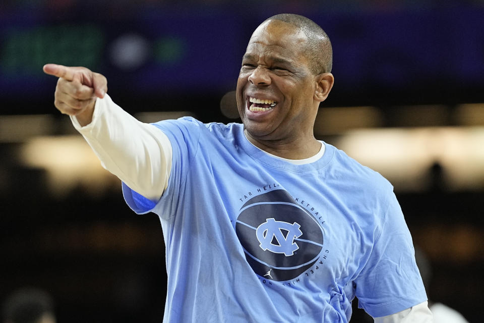 North Carolina head coach Hubert Davis points during practice for the men's Final Four NCAA college basketball tournament, Friday, April 1, 2022, in New Orleans. (AP Photo/David J. Phillip)