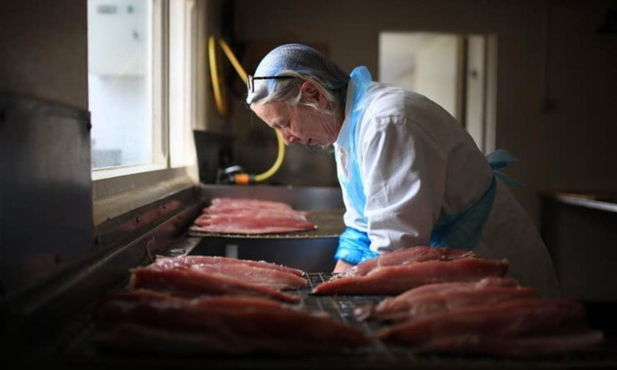 <span>Sally Ferns Barnes working at her award-winning Woodstock Smokery in West Cork, Ireland.</span><span>Photograph: @woodcocksmokery/instagram</span>