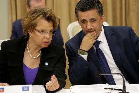 Special Representative of the Secretary-General and Head of MINUSTAH, Sandra Honore, and Permanent Representative of the Plurinational State of Bolivia to the United Nations, Sacha Sergio Llorenty Soliz, speak before meeting the Haitian president, Jovenel Moise, and his cabinet, in the National Palace of Port-au-Prince, Haiti, June 22, 2017. REUTERS/Andres Martinez Casares