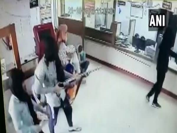 The armed men looted cash and snatched away the gun of the bank's security guard. (Photo/ANI)