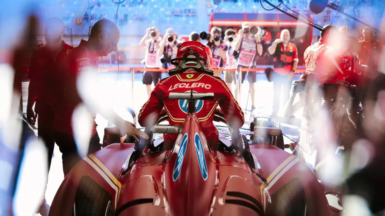  Scuderia Ferrari  F1 car and Charles Leclerc with HP branding. 