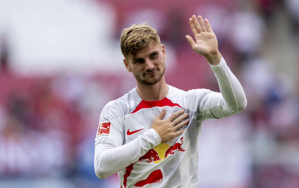 Leipzig's Timo Werner waves towards the supporters after the Bundesliga soccer match between RB Leipzig and 1. FC Cologne in Leipzig, Germany, Saturday, Aug. 13, 2022. (Hendrik Schmidt/dpa via AP)