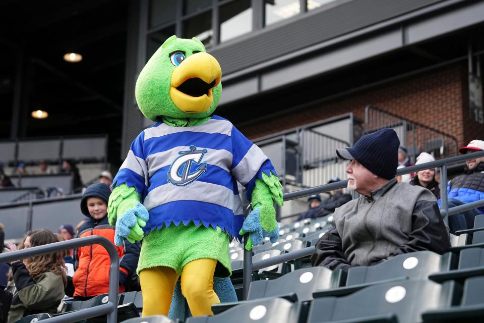 Apr 3, 2024; Columbus, OH, USA; Columbus Clippers mascot Krash interacts with fans during Opening Day against the Omaha Storm Chasers at Huntington Park.