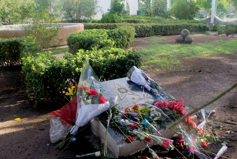 Flowers lie on a plaque inside the house of the late Mexican singer Juan Gabriel in Ciudad Juarez, Mexico on August 29, 2016