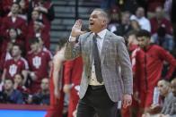 Ohio State head coach Chris Holtmann shouts during the first half of an NCAA college basketball game against Indiana, Saturday, Jan. 28, 2023, in Bloomington, Ind. (AP Photo/Darron Cummings)