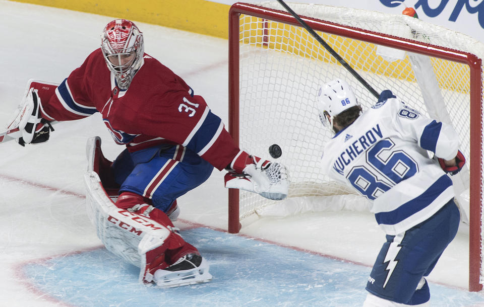 Montreal Canadiens goaltender Carey Price is scored on by Tampa Bay Lightning's Nikita Kucherov during the first period of an NHL hockey game Thursday, Jan. 2, 2020, in Montreal. (Graham Hughes/The Canadian Press via AP)